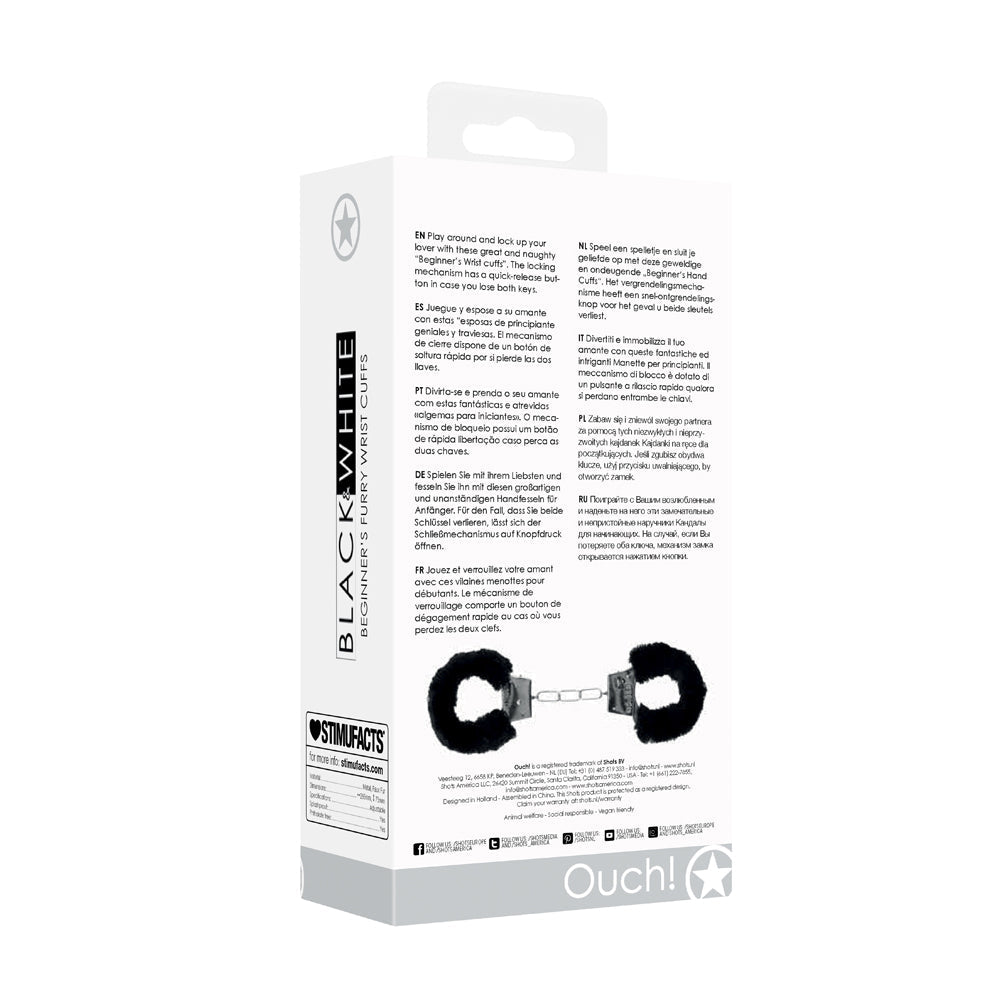 SHOTS - OUCH! BLACK & WHITE PLEASURE FURRY HANDCUFFS WITH QUICK-RELEASE BUTTON