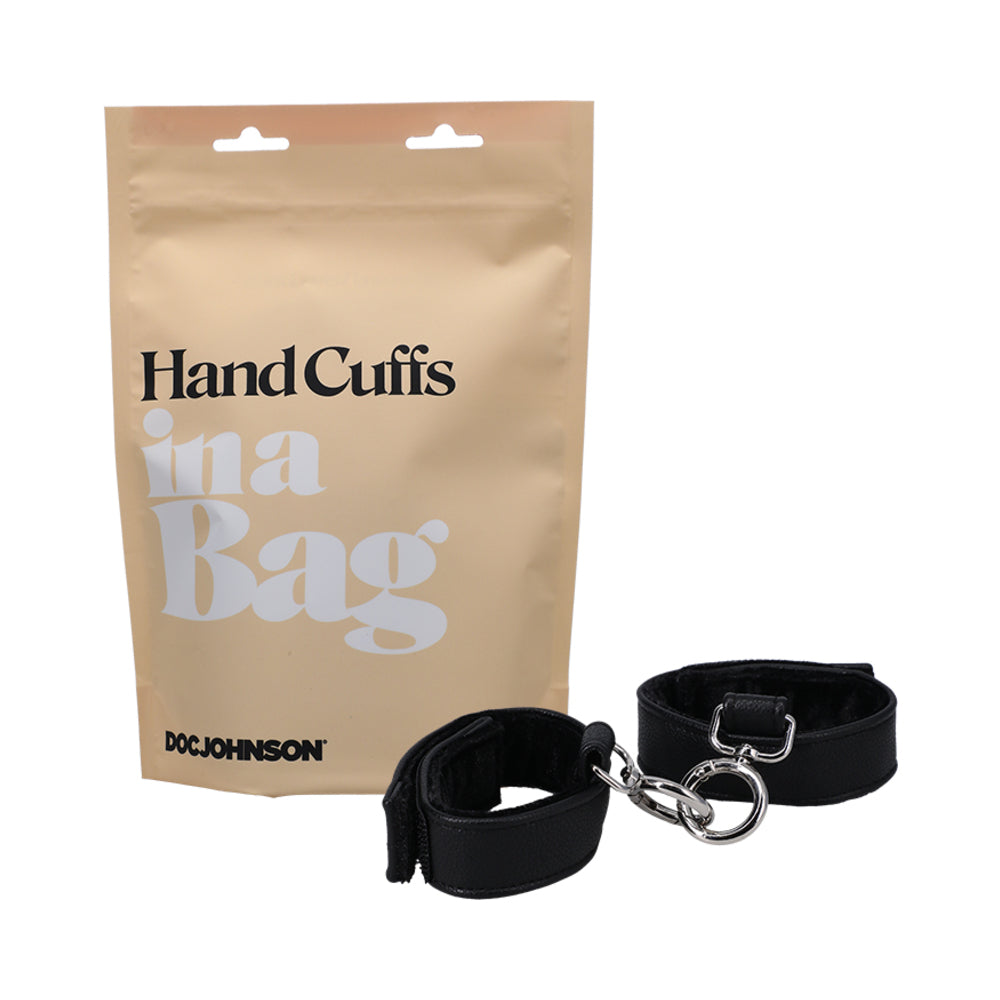 DOC JOHNSON HAND CUFFS IN A BAG FAUX LEATHER VELCRO BLACK