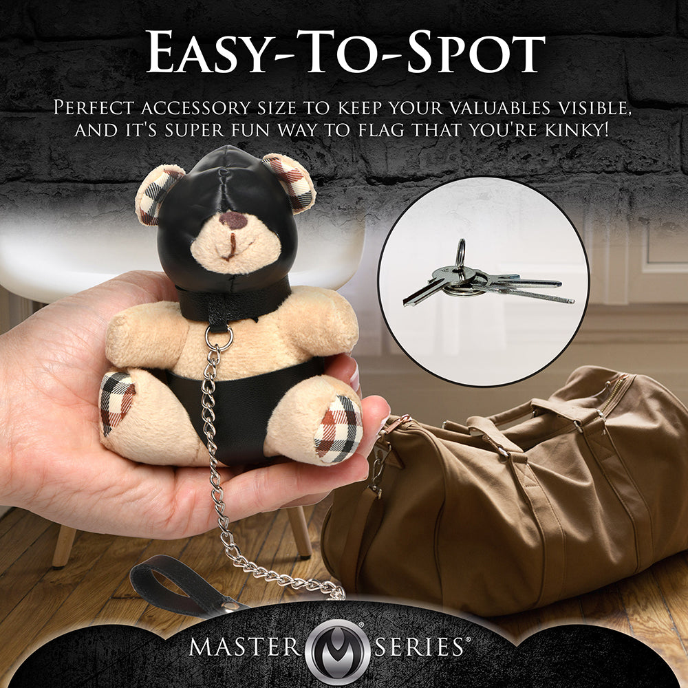 XR BRANDS - LLAVERO DE OSO DE PELUCHE CON CAPUCHA MASTER SERIES