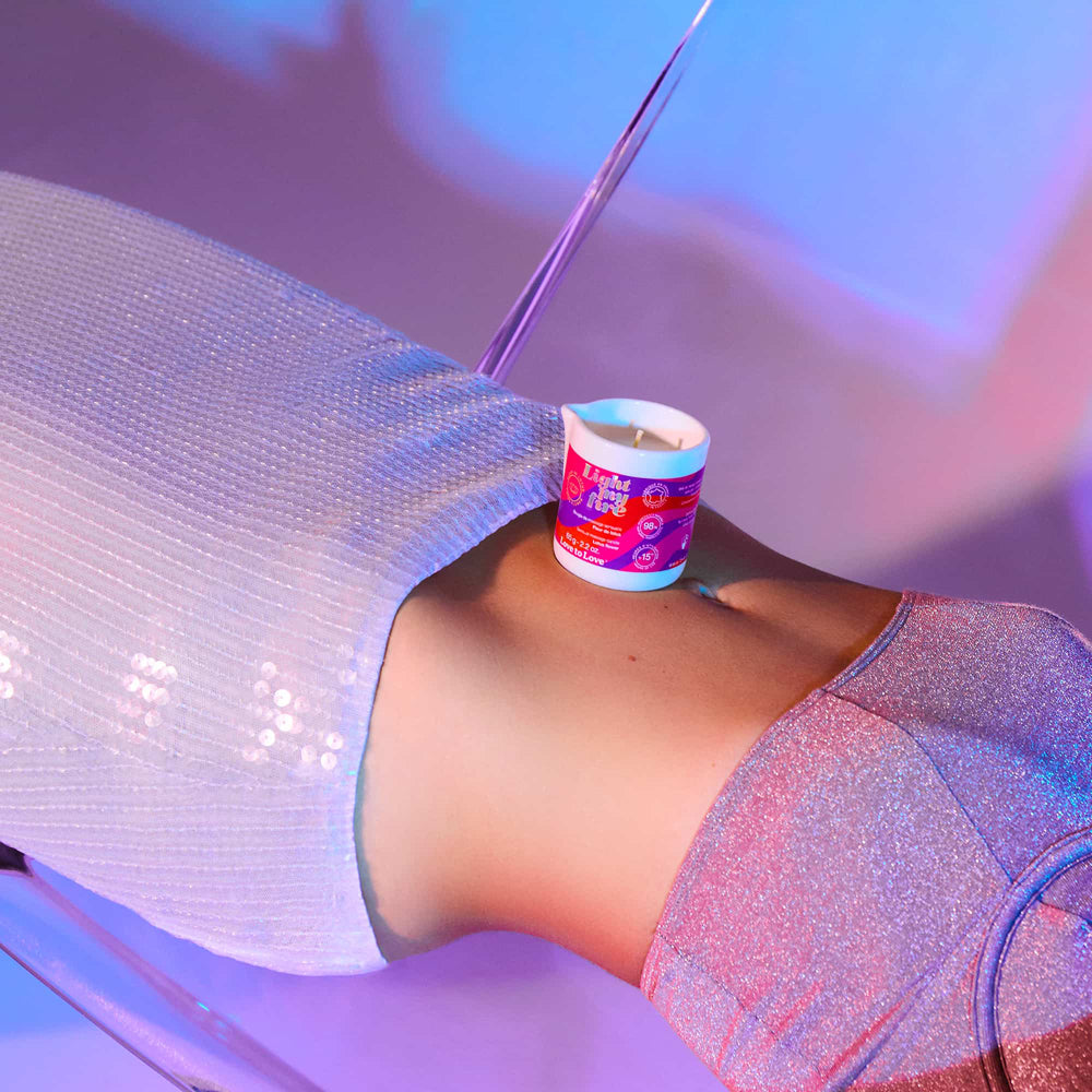 LOVE TO LOVE LIGHT MY FIRE SENSUAL MASSAGE CANDLE MONOI 2.2 OZ.