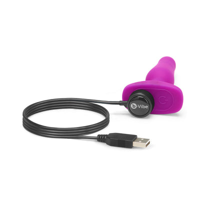 B-VIBE NOVICE RECHARGEABLE REMOTE-CONTROLLED VIBRATING SILICONE ANAL PLUG FUCHSIA