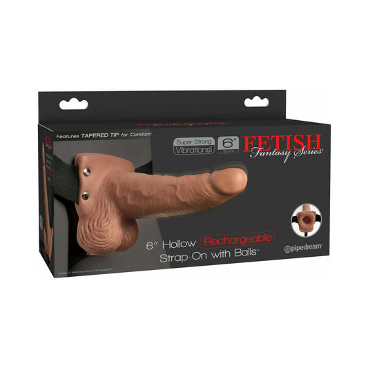 SERIE FANTASÍA FETICHE - ARNÉS AJUSTABLE PENE REALISTA CON TESTÍCULOS RECARGABLES Y VIBRADOR 15 CM