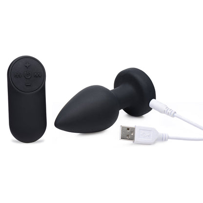 XR BRANDS - BOOTY SPARKS RECHARGEABLE LIGHT UP VIBRATING ANAL PLUG WITH REMOTE CONTROL MEDIUM