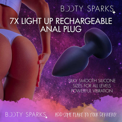 XR BRANDS - BOOTY SPARKS RECHARGEABLE LIGHT UP VIBRATING ANAL PLUG WITH REMOTE CONTROL MEDIUM