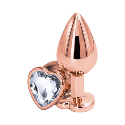 NS NOVEDADES - PLUG ANAL ROSA CORAZÓN ACTIVO TRASERO MEDIANO