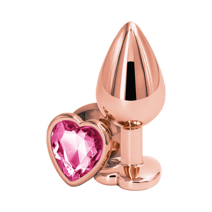 NS NOVEDADES - PLUG ANAL ROSA CORAZÓN ACTIVO TRASERO MEDIANO