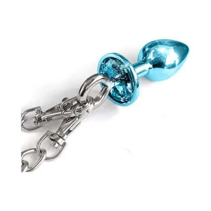 NOVEDADES GLOBALES - JUEGO DE BUTT PLUG METÁLICO NIXIE Y ESPOSAS PELUDAS TALLA MEDIANA AZUL METÁLICO
