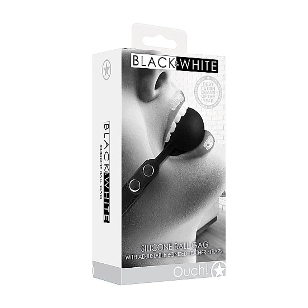 DISPAROS - ¡AY! MORDEDOR DE SILICONA BLANCO Y NEGRO CON CORREAS AJUSTABLES DE CUERO UNIDO NEGRAS