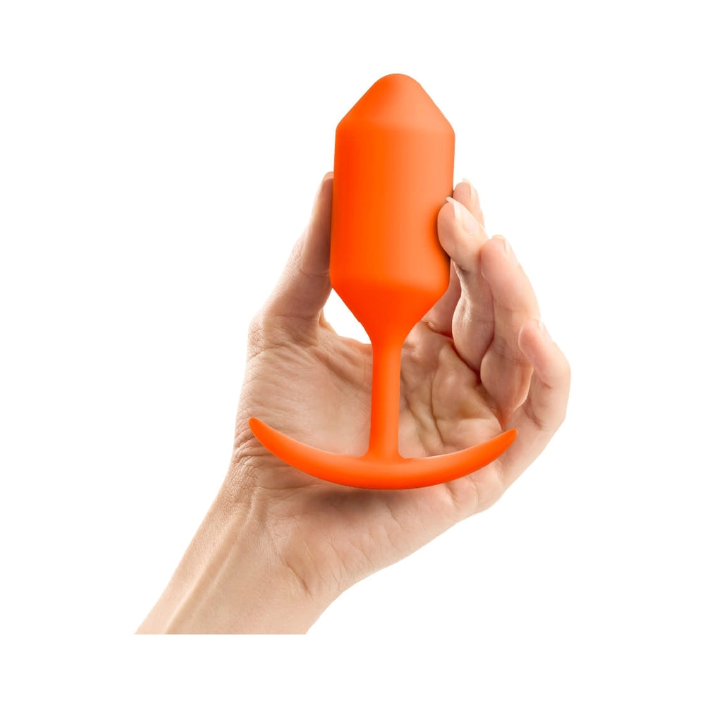 B-VIBE - SNUG PLUG 3 WEIGHTED SILICONE ANAL PLUG ORANGE