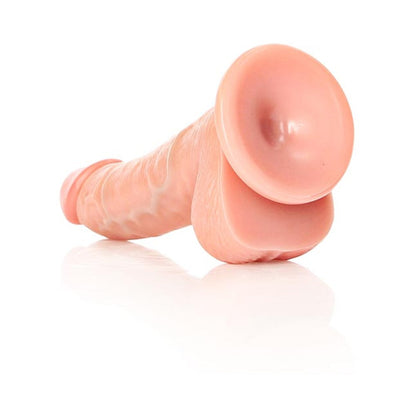 REALROCK REALISTIC 6 IN. CURVED DILDO WITH BALLS AND SUCTION CUP FLESH