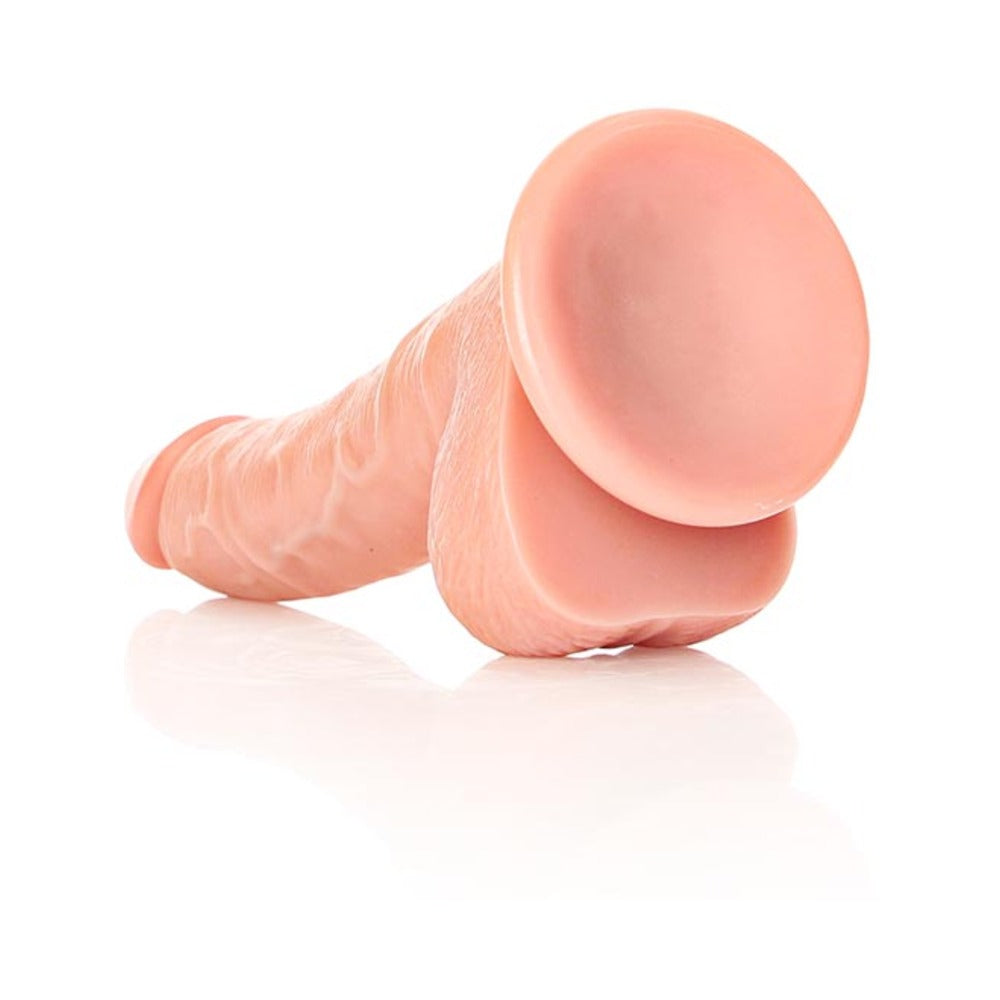 REALROCK REALISTIC 7 IN. CURVED DILDO WITH BALLS AND SUCTION CUP BEIGE
