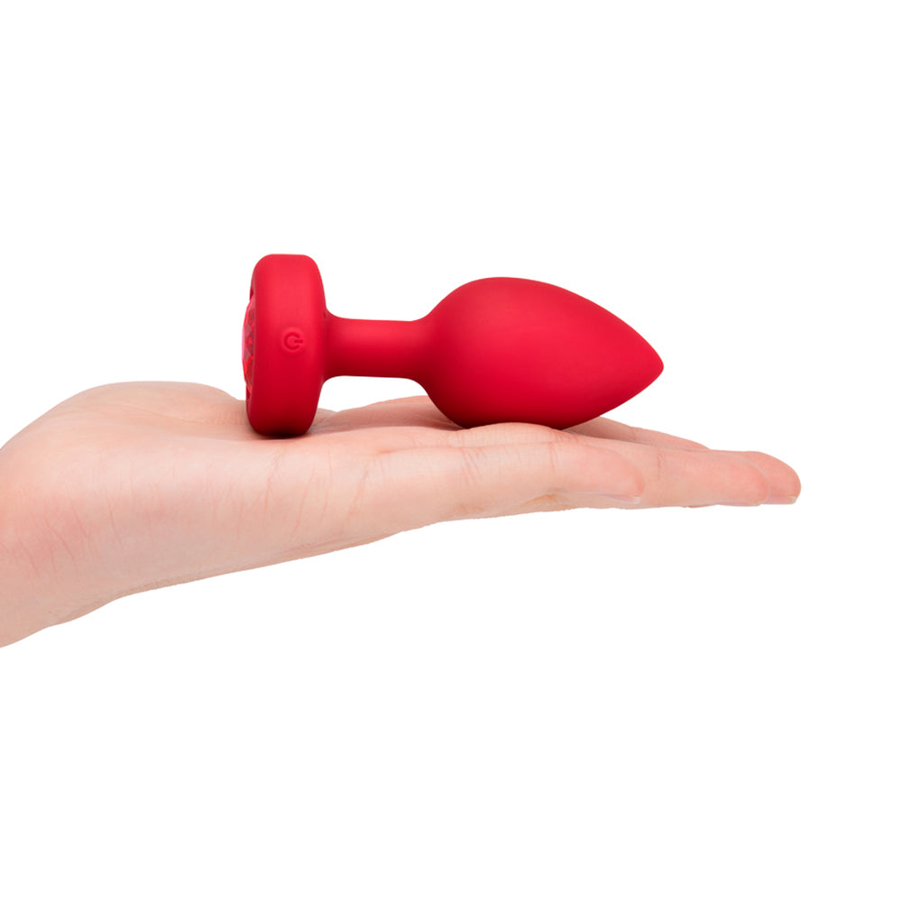 B-VIBE - VIBRATING HEART ANAL PLUG WITH HEART-SHAPED JEWEL BASE MEDIUM/LARGE RED