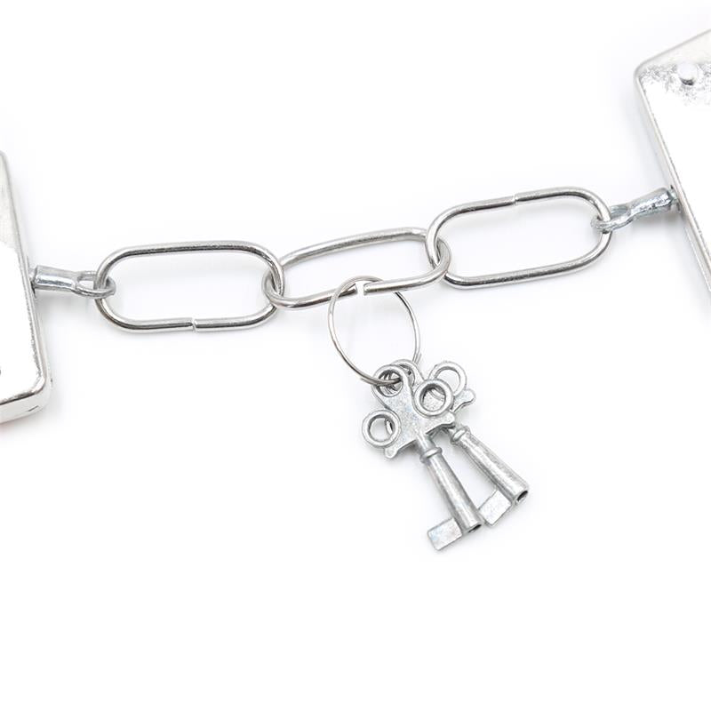 INTOYOU BDSM LINE - FURRY METAL HANDCUFFS PINK