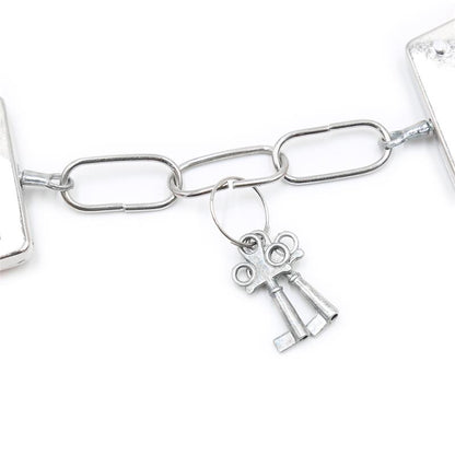 INTOYOU BDSM LINE - FURRY METAL HANDCUFFS PINK