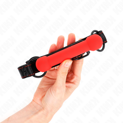 KINK - MORDAZA DE BOLA CON CORREA DE PIEL SINTÉTICA ROJA AJUSTABLE 41-57 CM