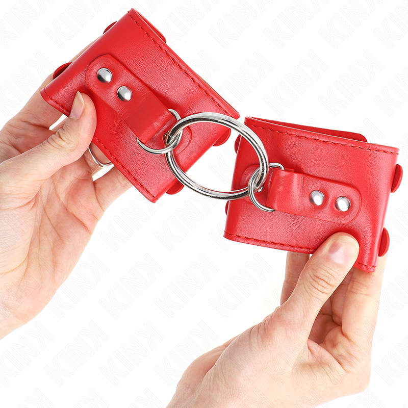 KINK - MENOTTES RIGIDES AVEC ANNEAU ET CLOUS, RÉGLABLES ROUGES 17-22 CM X 6,5 CM