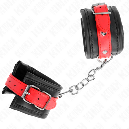 KINK - MUÑEQUERAS NEGRAS CON CORREA ROJA AJUSTABLES 17-28 CM X 6 CM