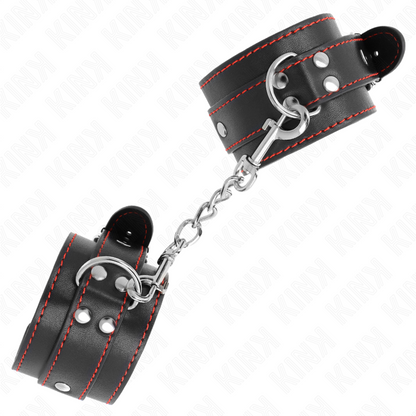 KINK - MENOTTES DE POIGNET NOIRES DOUBLURE ROUGE AJUSTABLES 20-28 CM X 5.5 CM