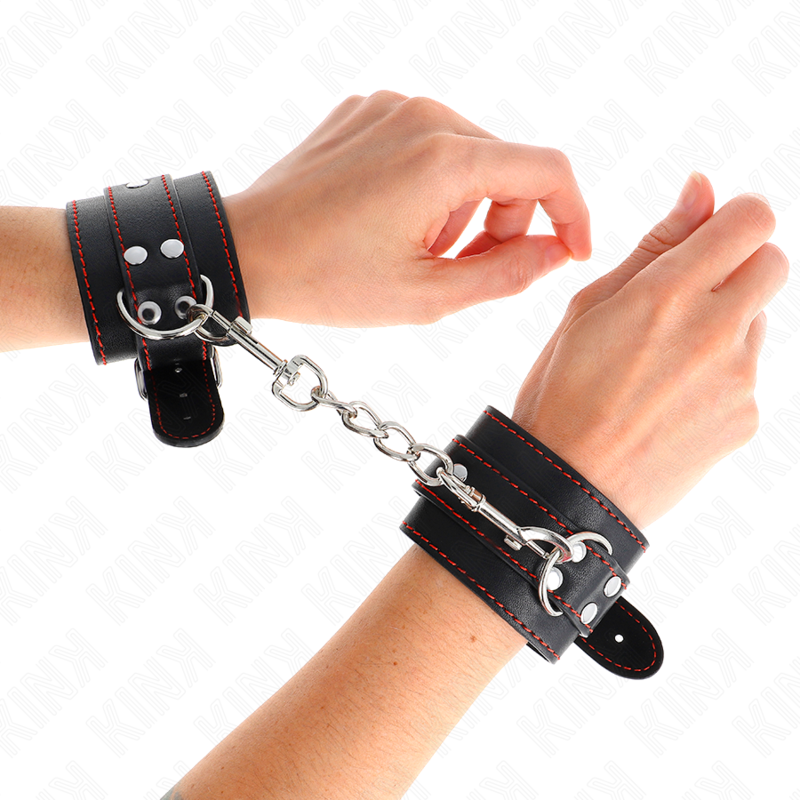 KINK - MENOTTES DE POIGNET NOIRES DOUBLURE ROUGE AJUSTABLES 20-28 CM X 5.5 CM