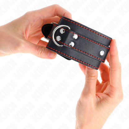KINK - MENOTTES DE POIGNET NOIRES DOUBLURE ROUGE AJUSTABLES 20-28 CM X 5.5 CM