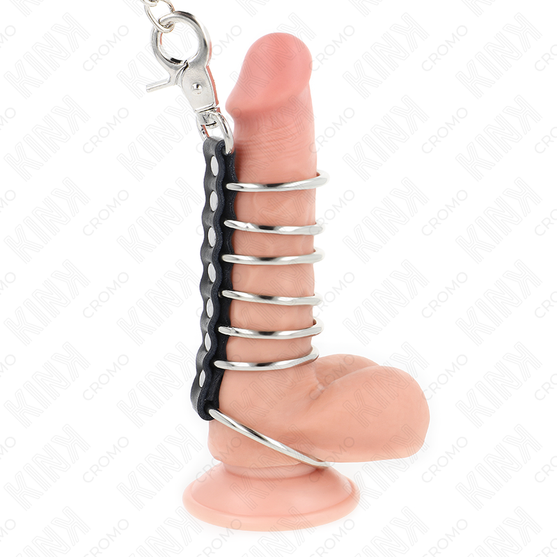 KINK - 7 ANNEAUX DE PÉNIS EN MÉTAL DE 3,8 CM À 5 CM RELIÉS PAR DU CUIR ET UNE CHAÎNE EN MÉTAL DE 100 CM