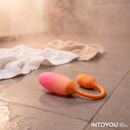 INTOYOU APP SERIES - NEXEGG VIBRATING EGG DOUBLE SILICONE LAYER APP ORANGE/PINK